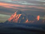 Kangchenjunga 02 02 Makalu South Face From Basantpur Alpenglow lights the south face and southeast ridge of Makalu (8463m) from the southeast, just before we reached Basantpur (2200m).